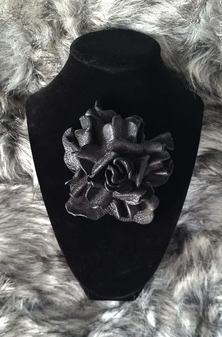 Black leather flower pin